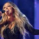 Illustration for article titled The oracle Mariah Carey, draped in mist, emerges from shrine to speak on Thanksgiving, dog hair